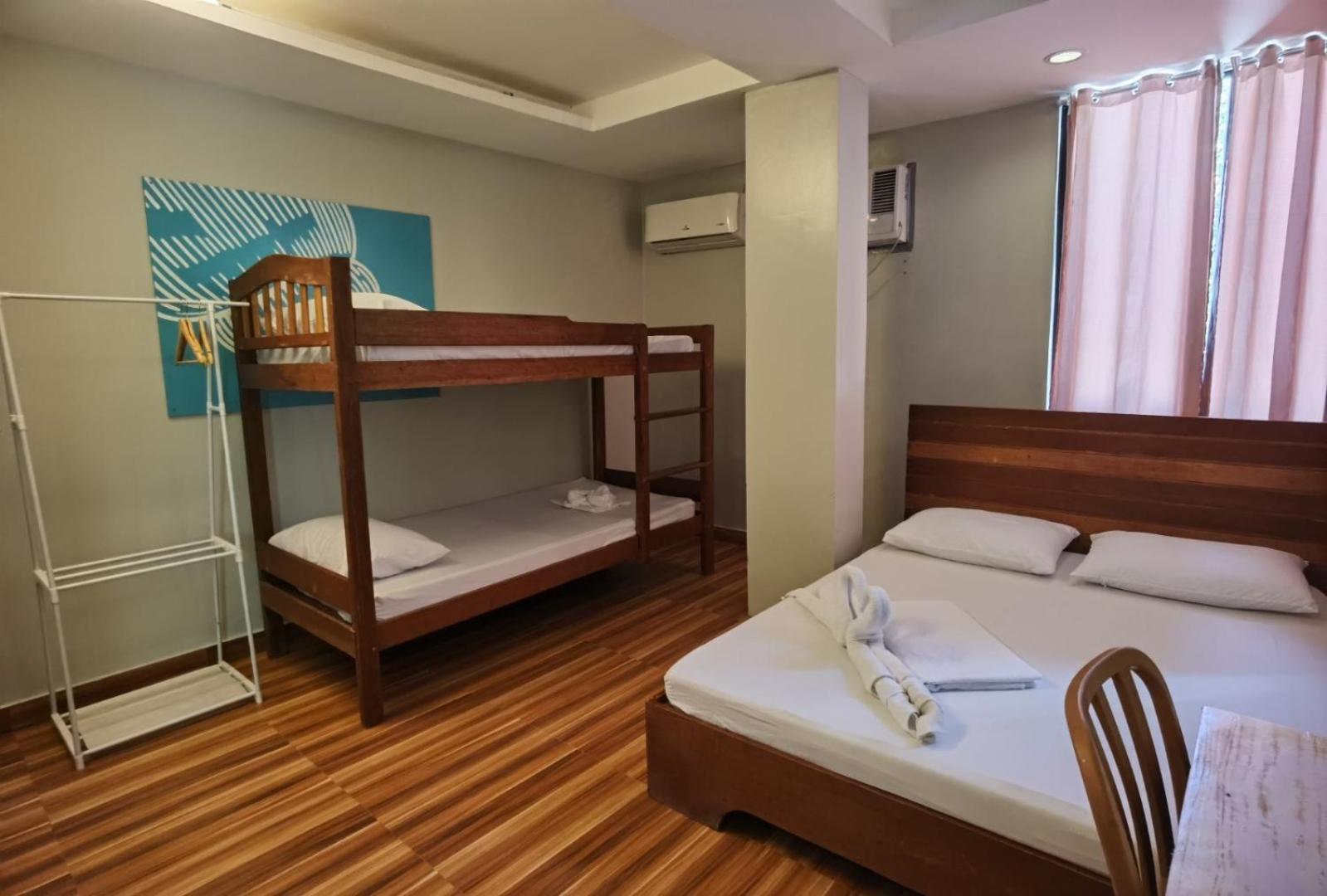 Amos Pili Tree Inn Powered By Cocotel 엘니도 객실 사진
