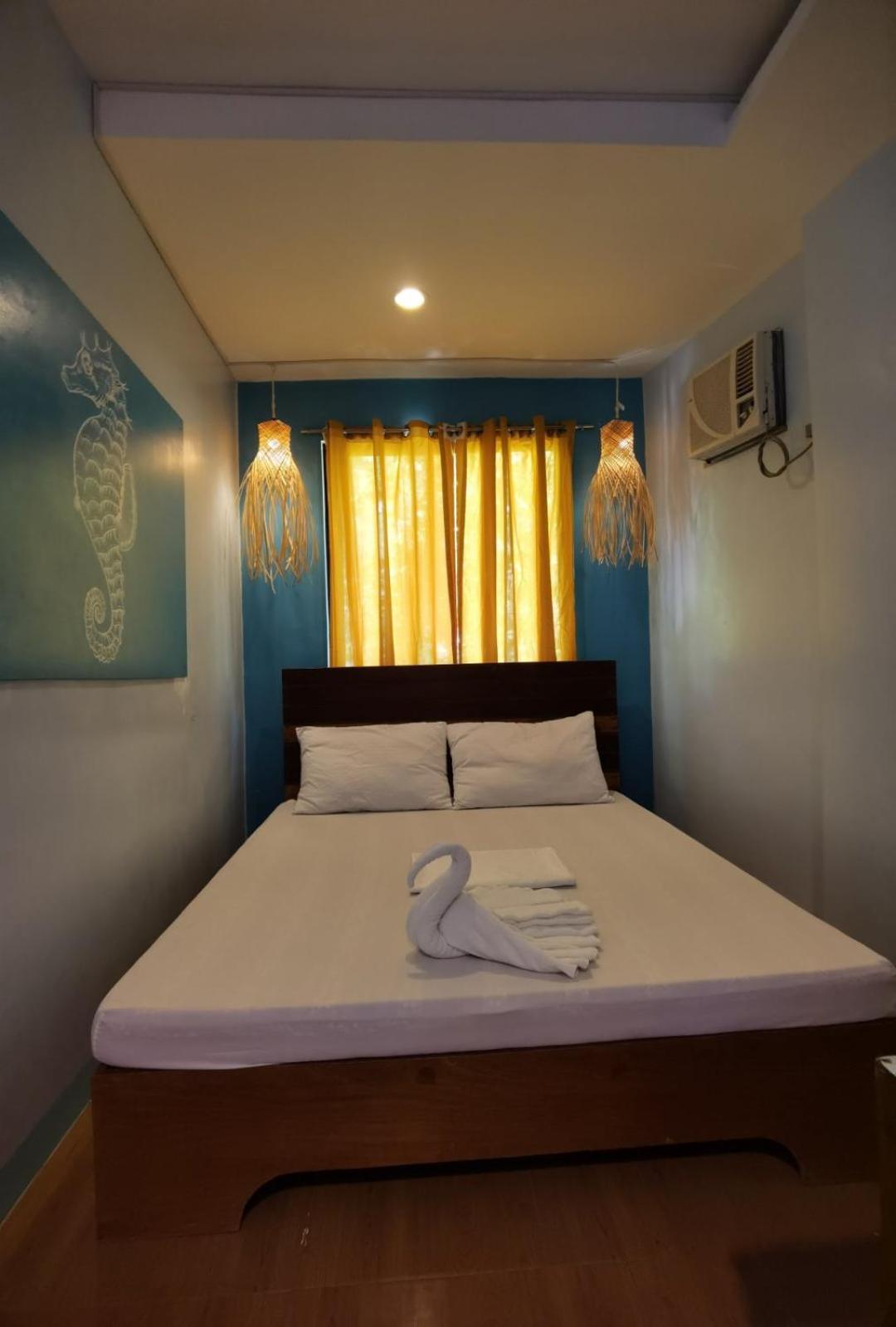 Amos Pili Tree Inn Powered By Cocotel 엘니도 객실 사진