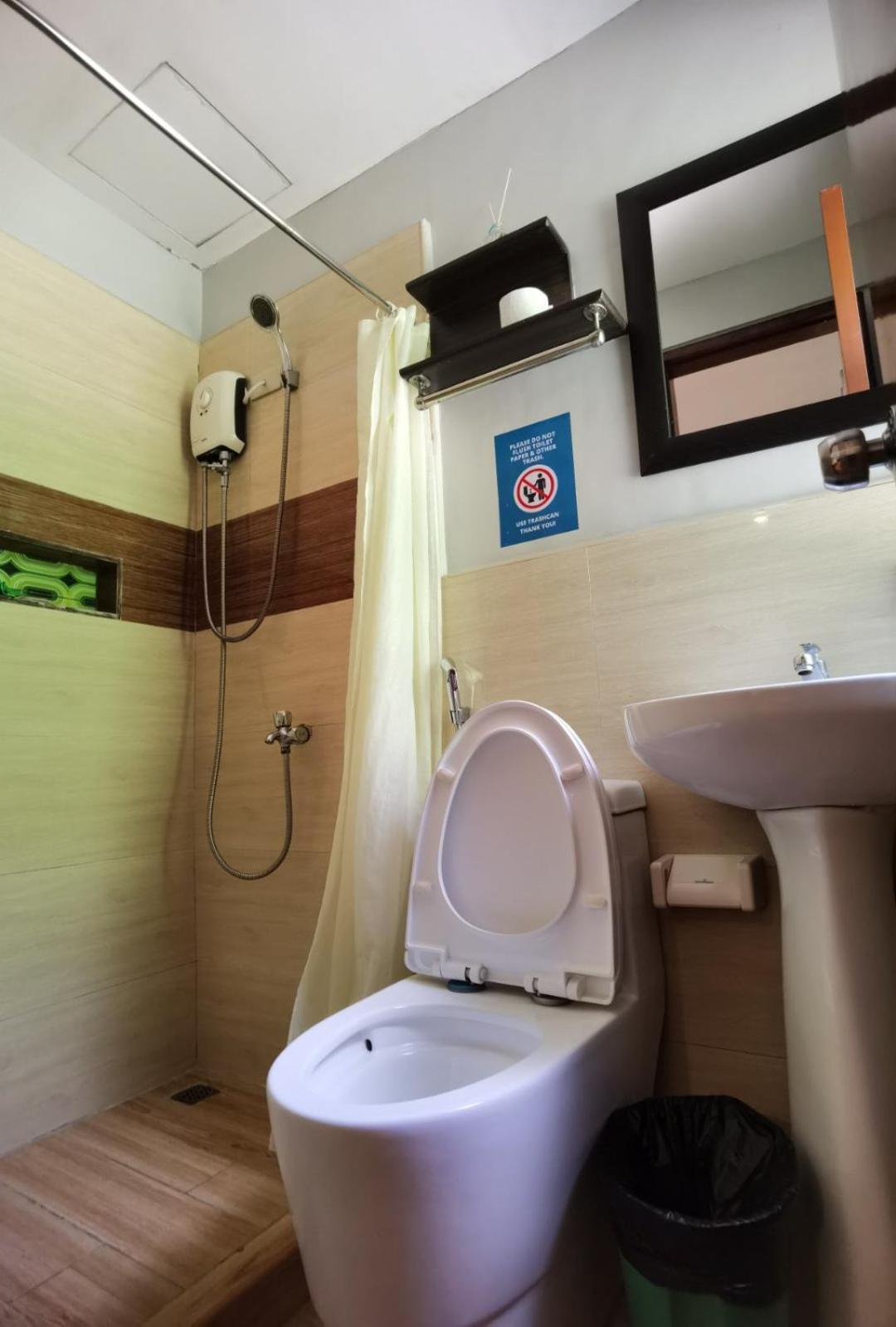 Amos Pili Tree Inn Powered By Cocotel 엘니도 객실 사진
