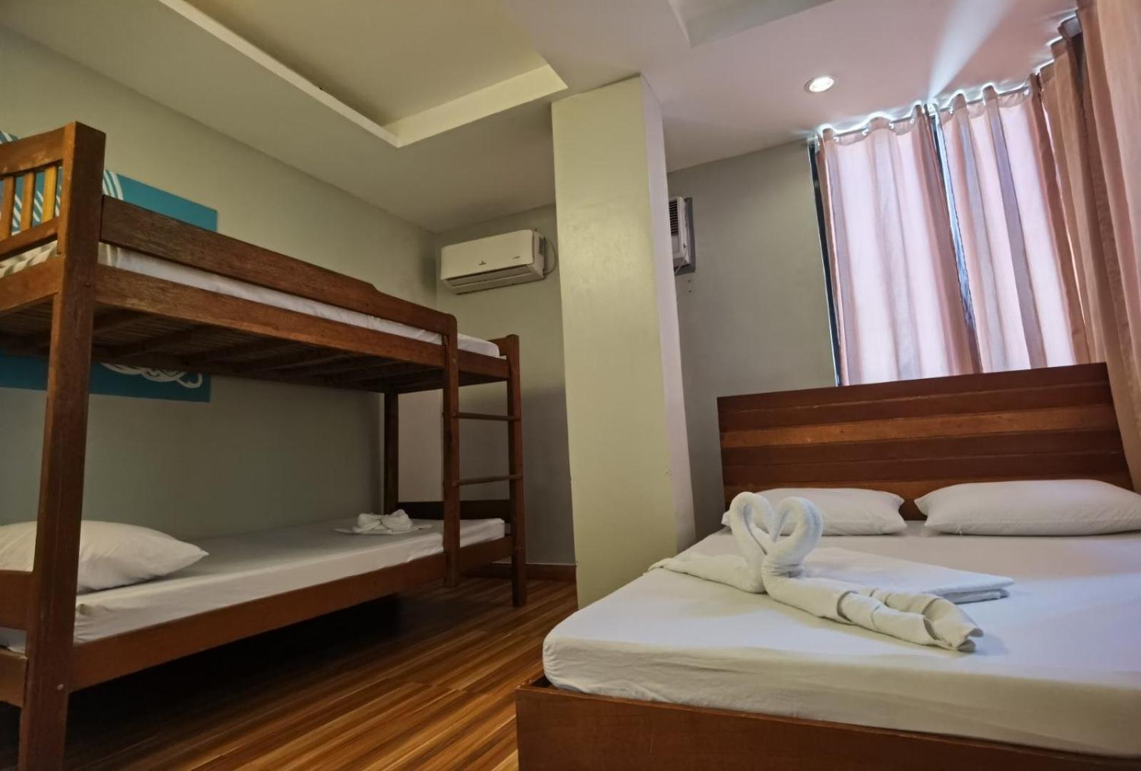 Amos Pili Tree Inn Powered By Cocotel 엘니도 객실 사진