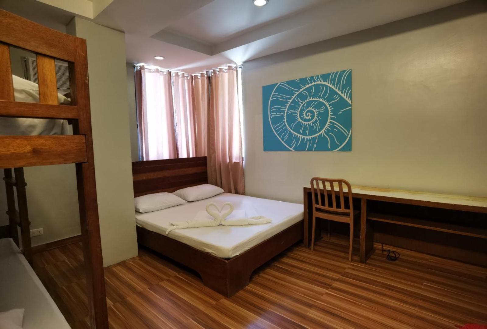 Amos Pili Tree Inn Powered By Cocotel 엘니도 객실 사진